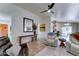 Spacious living room with open floor plan and modern decor, including a unique wood table at 2101 S Meridian Rd # 250, Apache Junction, AZ 85120