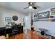 Home office space with hardwood floors and a dark desk at 2101 S Meridian Rd # 250, Apache Junction, AZ 85120