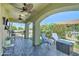 Covered patio featuring outdoor seating, a bar, and a view of the landscaped yard at 2101 S Meridian Rd # 250, Apache Junction, AZ 85120