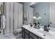 Stylish bathroom featuring dual sinks, modern fixtures, and a serene atmosphere at 24121 N 24Th Pl, Phoenix, AZ 85024