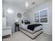 Charming bedroom featuring a plush bed, decorative mirrors, and ample natural light at 24121 N 24Th Pl, Phoenix, AZ 85024