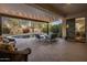 Covered patio with comfortable seating overlooking the pool at 24121 N 24Th Pl, Phoenix, AZ 85024