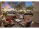 Inviting patio with stylish furniture and lovely neighborhood views at 24121 N 24Th Pl, Phoenix, AZ 85024