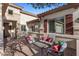 Inviting outdoor patio with stylish seating and charming architectural details, perfect for relaxing at 24121 N 24Th Pl, Phoenix, AZ 85024