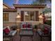 Charming patio with ample seating and ambient lighting, great for relaxing outdoors at 24121 N 24Th Pl, Phoenix, AZ 85024