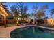 Backyard pool with patio furniture and putting green at 24121 N 24Th Pl, Phoenix, AZ 85024