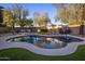 Backyard pool with putting green and outdoor seating at 24121 N 24Th Pl, Phoenix, AZ 85024
