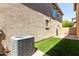 Artificial turf is featured in a low maintenance backyard at 2543 N 73Rd Dr, Phoenix, AZ 85035