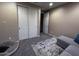 A bedroom with plush carpet, and a closet at 25955 W Deer Valley Rd, Buckeye, AZ 85396