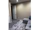Bedroom with neutral walls, plush carpet, and ample natural light at 25955 W Deer Valley Rd, Buckeye, AZ 85396