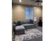 Comfortable living room with plush seating, modern decor, and a serene ambiance for relaxation at 25955 W Deer Valley Rd, Buckeye, AZ 85396