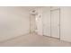 Neutral bedroom with closet space and a doorway, offering a cozy and functional space at 321 W Betsy Ln, Gilbert, AZ 85233