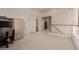 Spacious bonus room with neutral walls, plush carpeting, and many doorways at 321 W Betsy Ln, Gilbert, AZ 85233
