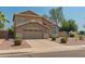 Attractive two-story home with a well-maintained front yard and a two-car garage at 321 W Betsy Ln, Gilbert, AZ 85233