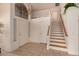 Bright foyer with tile flooring, staircase, and high ceilings at 321 W Betsy Ln, Gilbert, AZ 85233