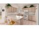 Traditional kitchen features tiled floor, bright counters, and white appliances at 321 W Betsy Ln, Gilbert, AZ 85233