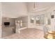 Open-concept living room and kitchen with abundant natural light at 321 W Betsy Ln, Gilbert, AZ 85233