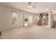 Open concept living space with sliding glass doors and access to the kitchen at 321 W Betsy Ln, Gilbert, AZ 85233