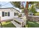 Spacious backyard with outdoor dining, barbecue area, and lush landscaping at 3308 N 51St St, Phoenix, AZ 85018