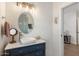 Charming bathroom featuring a vessel sink, marble countertop, and decorative vanity at 3308 N 51St St, Phoenix, AZ 85018