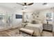 Cozy main bedroom featuring hardwood floors, and a ceiling fan at 3308 N 51St St, Phoenix, AZ 85018
