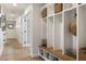 Stylish mudroom with custom built-ins, open shelving, and rich wood accents at 3308 N 51St St, Phoenix, AZ 85018