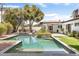 Sparkling swimming pool with tanning deck and lush landscaping, perfect for outdoor relaxation and entertainment at 3308 N 51St St, Phoenix, AZ 85018