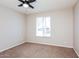 This bedroom features neutral paint, new carpet, and a ceiling fan for added comfort at 3337 W Yucca St, Phoenix, AZ 85029