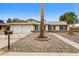 Inviting home exterior with mature landscaping, double garage, and easy access at 3337 W Yucca St, Phoenix, AZ 85029