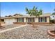 Charming single-story home featuring a low-maintenance rock yard and covered entryway at 3337 W Yucca St, Phoenix, AZ 85029