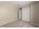 Bedroom with sliding door closet and neutral color carpet and paint at 3631 E Long Lake Rd, Phoenix, AZ 85048