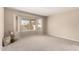 Bright bedroom featuring a bay window with neighborhood views and neutral carpeting at 3631 E Long Lake Rd, Phoenix, AZ 85048