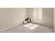 Cozy bedroom with neutral decor, carpet, and a window letting in natural light at 3631 E Long Lake Rd, Phoenix, AZ 85048