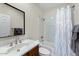 Bright bathroom featuring a bathtub with shower, vanity with sink and large mirror at 3935 E Rough Rider Rd # 1016, Phoenix, AZ 85050
