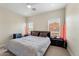 Cozy bedroom with soft lighting, a comfortable bed, and neutral decor at 3935 E Rough Rider Rd # 1016, Phoenix, AZ 85050