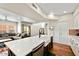 Modern kitchen showcasing a large island with a sink and stainless steel dishwasher at 3935 E Rough Rider Rd # 1016, Phoenix, AZ 85050