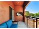 Comfortable outdoor patio with a seating area, TV, and views of the surrounding community at 3935 E Rough Rider Rd # 1016, Phoenix, AZ 85050