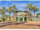 Exterior of a Barnes & Noble at Desert Ridge Marketplace with lush palm trees and blue skies at 3935 E Rough Rider Rd # 1016, Phoenix, AZ 85050