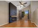 Bright living room featuring high ceilings, modern fireplace, and a large window at 4753 E Bighorn Ave, Phoenix, AZ 85044