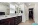 Bathroom featuring a double sink vanity and walk-in closet at 4901 S Turbine --, Mesa, AZ 85212