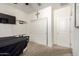 Bedroom with flat-screen TV, closet, black-out curtains, and carpeted floor at 4901 S Turbine --, Mesa, AZ 85212