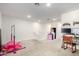 Large bonus room with carpet, ballet bar, desk and white staircase at 4901 S Turbine --, Mesa, AZ 85212