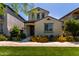 Inviting home exterior featuring a well-manicured lawn and vibrant flower beds at 4901 S Turbine --, Mesa, AZ 85212