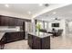 Spacious kitchen with an island that flows seamlessly into a cozy living area at 4901 S Turbine --, Mesa, AZ 85212