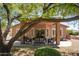 Inviting covered patio with outdoor furniture, perfect for enjoying the backyard view at 4976 S Sugarberry Ln, Gilbert, AZ 85298