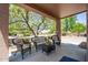 Spacious covered patio with seating area, ideal for entertaining guests at 4976 S Sugarberry Ln, Gilbert, AZ 85298