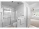 Bright bathroom featuring a glass-enclosed shower and access to the adjacent bedroom at 4976 S Sugarberry Ln, Gilbert, AZ 85298