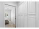 Bedroom access with linen closet offering storage and convenient access at 4976 S Sugarberry Ln, Gilbert, AZ 85298