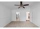 Bedroom features carpeted floors with two doorways at 4976 S Sugarberry Ln, Gilbert, AZ 85298