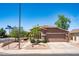 Beautiful home exterior featuring a well-maintained yard on a corner lot at 4976 S Sugarberry Ln, Gilbert, AZ 85298